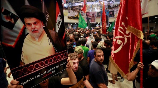 الصدر يدعو حلفاءه للانسحاب من البرلمان ويرفض "حكومة توافقية"