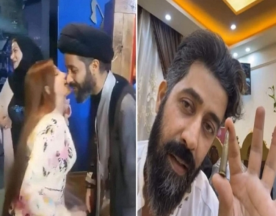 هروب رجل الدين الشيعي "علي الشريفي" من بغداد بعد تهديده بالقتل لتقبيله فتاة
